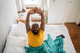 Man stretching when waking